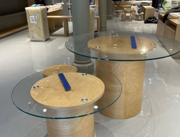 millwork_install_gurskyi_Round Oak Display Tables – Commercial & Hospitality