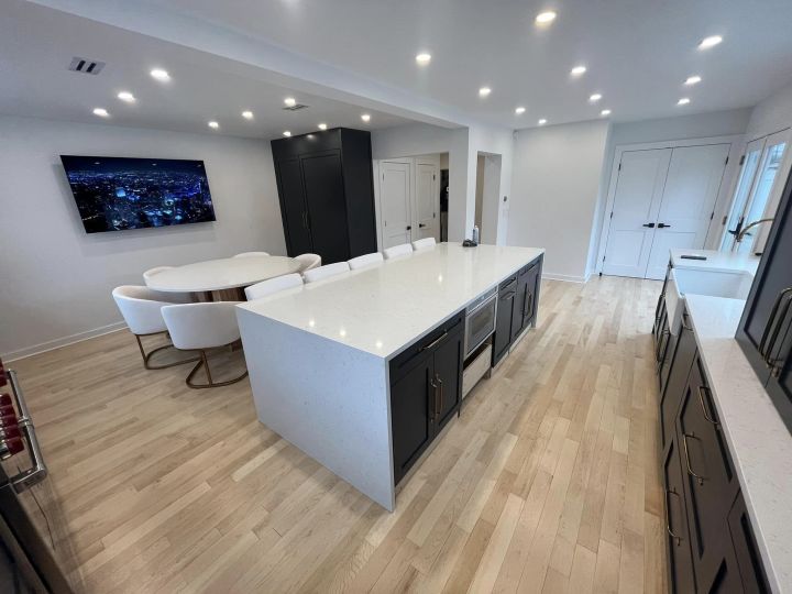 millwork_install_gurskyi_Chef Kitchen Quartz Waterfall Island – Kitchens & Cabinetry